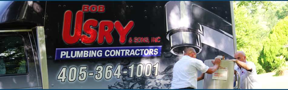Usry team installing a water heater