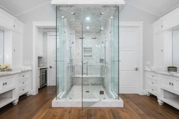 Custom tile shower with premium plumbing fixtures